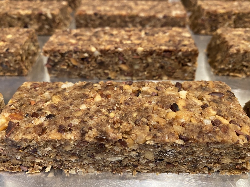 Unwrapped G-Bars arranged across a metal surface.